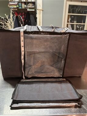 Blanket/clothing Storage with Window. Bag 12x24, two double way zippers.